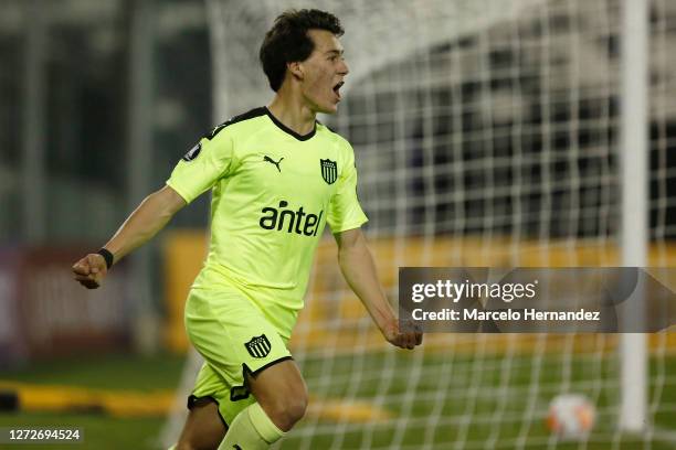 Facundo Pellistri of Peñarol celebrates after scoring the first goal of his team during a group C match between Colo Colo and Peñarol as part of Copa...
