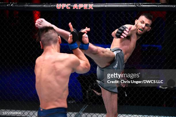 Korey Kuppe kicks Michael Lombardo in their welterweight bout during week seven of Dana White's Contender Series season four at UFC APEX on September...