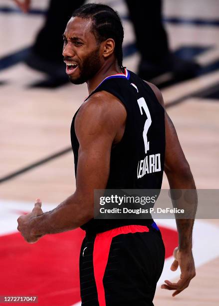 Kawhi Leonard of the LA Clippers reacts during the fourth quarter against the Denver Nuggets in Game Seven of the Western Conference Second Round...