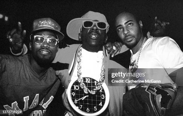 Daddy-O of Stetsasonic, Flavor Flav and Wise the Human Mix Machine of Stetsasonic pose for a photo at a party for the release of Run DMC's album...