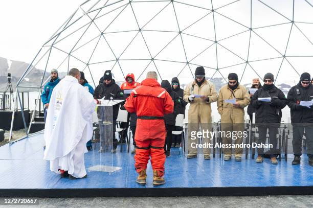 The Chaplains of the Brazilian Navy hold the first mass blessing the new Comandante Ferraz Station with the presence of the Base Group Officers and...