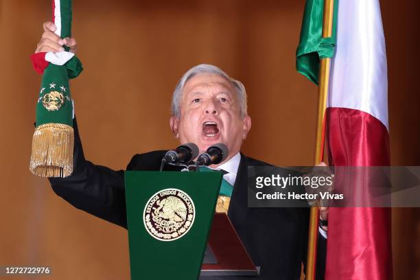 Mexican President Andres Manuel Lopez Obrador delivers a speech as he gives the annual independence shout from the balcony of the National Palace to...