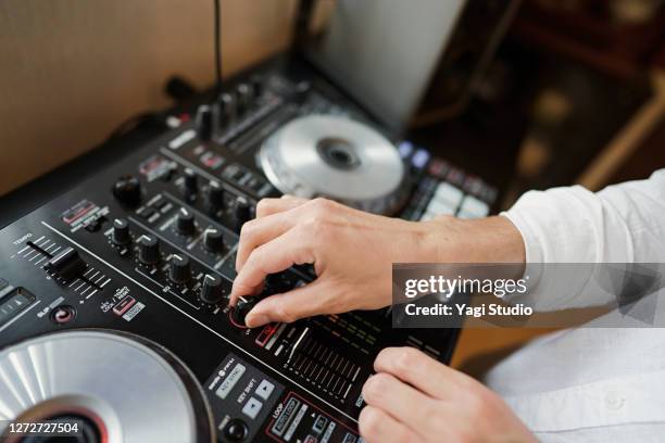 japanese men enjoy djing as a hobby at home - djiang stock pictures, royalty-free photos & images