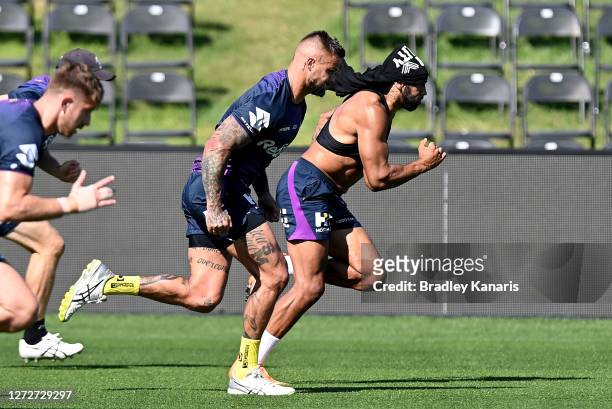 Josh Addo-Carr and Sandor Earl race each other during a Melbourne Storm NRL training session at Sunshine Coast Stadium on September 16, 2020 in...