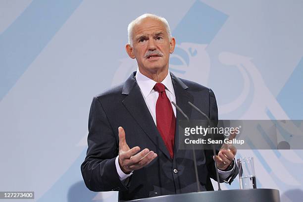 Greek Prime Minister George Papandreou speaks to the media prior to talks with German Chancellor Angela Merkel at the Chancellery on September 27,...