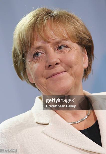 German Chancellor Angela Merkel speaks to the media prior to talks with Greek Prime Minister George Papandreou at the Chancellery on September 27,...
