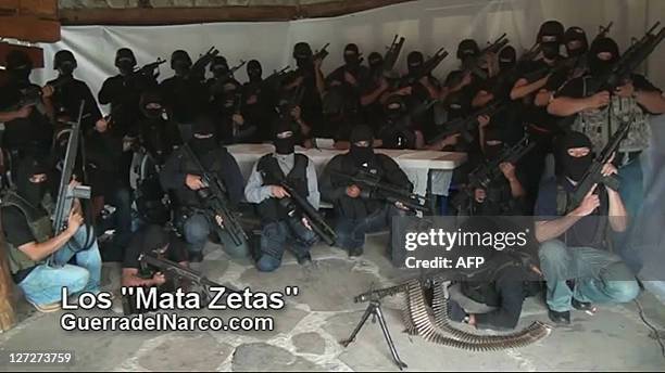 Screen capture of a paramilitary group which vowed to "eliminate" the Zetas, reputedly Mexico's most violent drug gang, in a video posted on the...