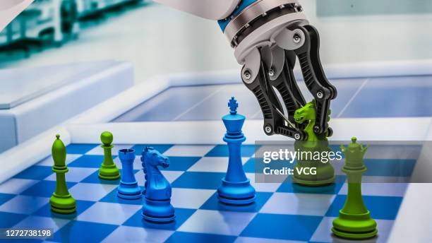 Robot plays chess during 2020 China International Industry Fair at the National Convention and Exhibition Centre on September 15, 2020 in Shanghai,...