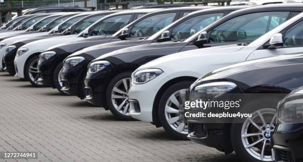 used bmw cars parked at a public car dealership in hamburg, germany - capô de carro imagens e fotografias de stock