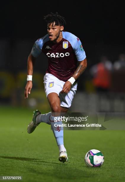 Tyrone Mings of Aston Villa runs with the ball during the Carabao Cup Second Round match between Burton Albion and Aston Villa at Pirelli Stadium on...