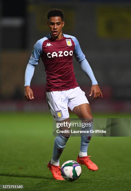 Jacob Ramsey of Aston Villa runs with the ball during the Carabao Cup Second Round match between Burton Albion and Aston Villa at Pirelli Stadium on...
