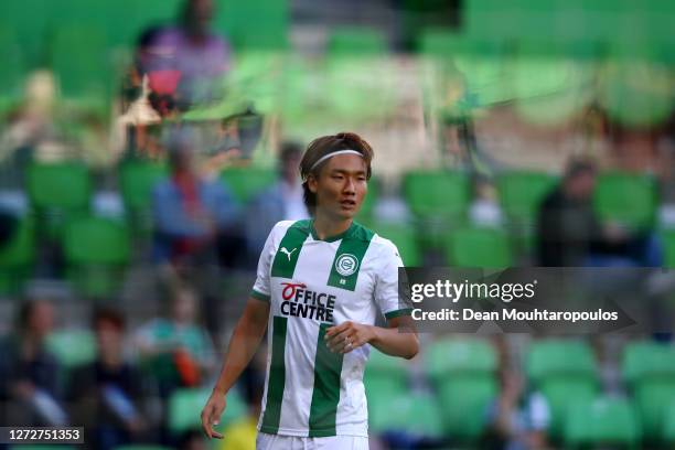 Ko Itakura of Football Club Groningen looks on during the Dutch Eredivisie match between FC Groningen and PSV Eindhoven at Hitachi Capital Mobility...