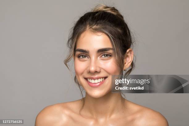 young woman portrait - soft smile portrait stock pictures, royalty-free photos & images