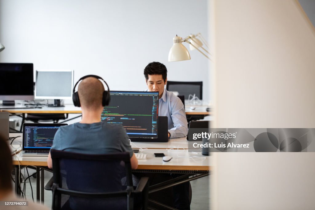 Computer Programmers Working At Startup Company High-Res Stock Photo ...