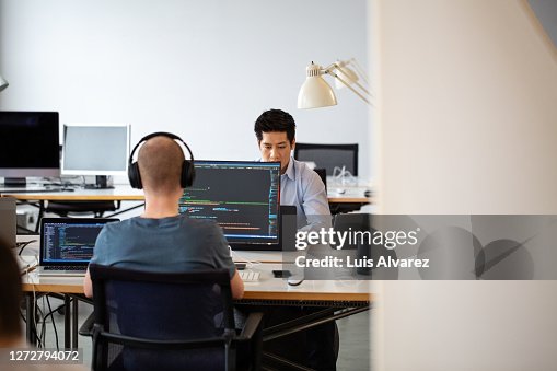 Computer Programmers Working At Startup Company High-Res Stock Photo ...