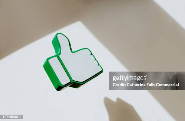 thumbs up - content stock pictures, royalty-free photos & images