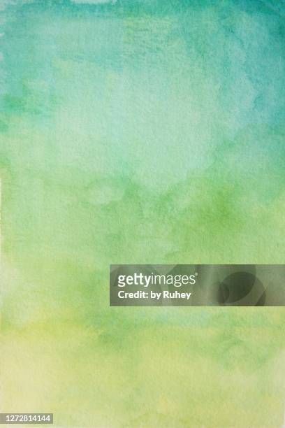 abstract watercolor background painting in green tones - aquarell grün stock-fotos und bilder