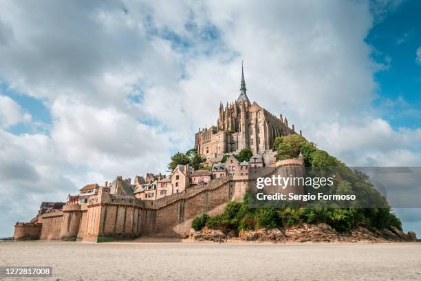 low tide mont-saint-michel normandy france - mont saint michel stock pictures, royalty-free photos & images