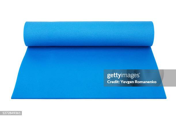 yoga mat isolated on white background - rolled up yoga mat stock pictures, royalty-free photos & images