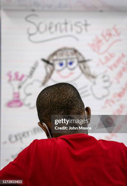 Fourth grader takes part in a math and science class at Stark Elementary School on September 16, 2020 in Stamford, Connecticut. Most students at...