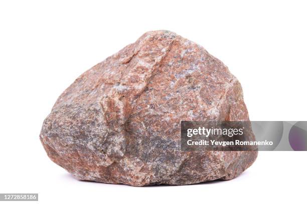 large granite stone on white background - ロック ストックフォトと画像