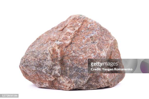 large granite stone on white background - rock object stock pictures, royalty-free photos & images