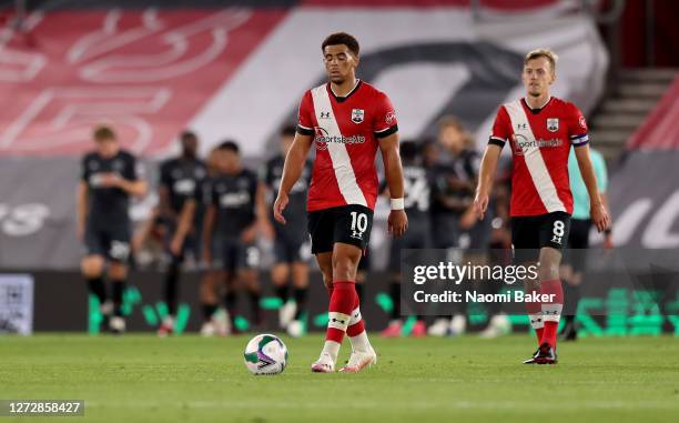 Che Adams of Southampton looks dejected after his team concede during the Carabao Cup Second Round match between Southampton FC and Brentford FC at...
