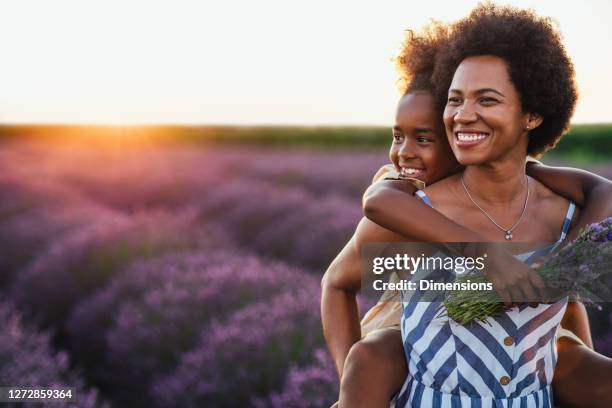 t's a happy vibe at the lavender field today - beautiful older black women stock pictures, royalty-free photos & images