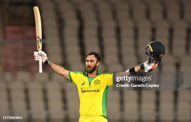 Glenn Maxwell of Australia celebrates reaching his century during the 3rd Royal London One Day International Series match between England and...