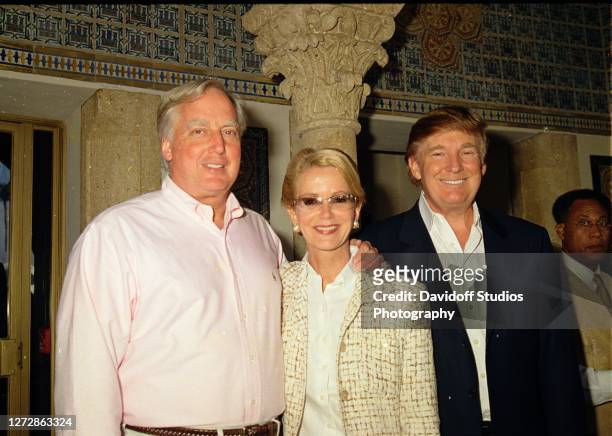 Portrait of married couple, real estate developer Robert Trump and Blaine Trump, as they pose with the former's bother, fellow deveioper Donald...