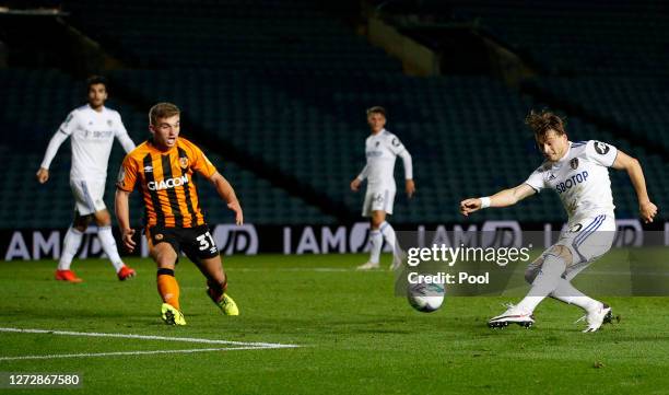 Ezgjan Alioski of Leeds United scores his team's first goal during the Carabao Cup Second Round match between Leeds United and Hull City at Elland...