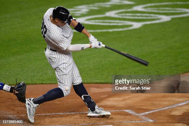 Aaron Judge of the New York Yankees strikes out swinging in his first at-bat after coming off the IL during the first inning against the Toronto Blue...