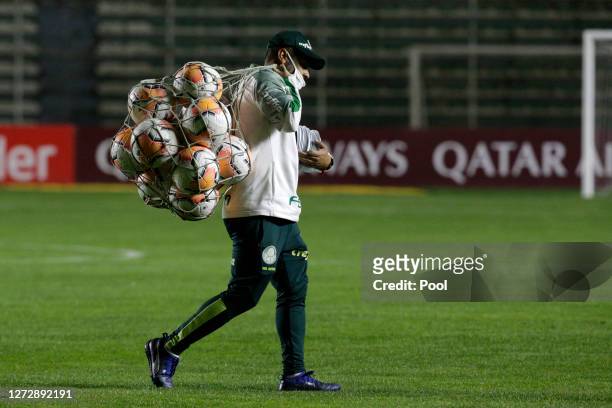 Palmeiras coach assitant carries official match balls before a group B match of Copa CONMEBOL Libertadores 2020 between Bolivar and Palmeiras at...