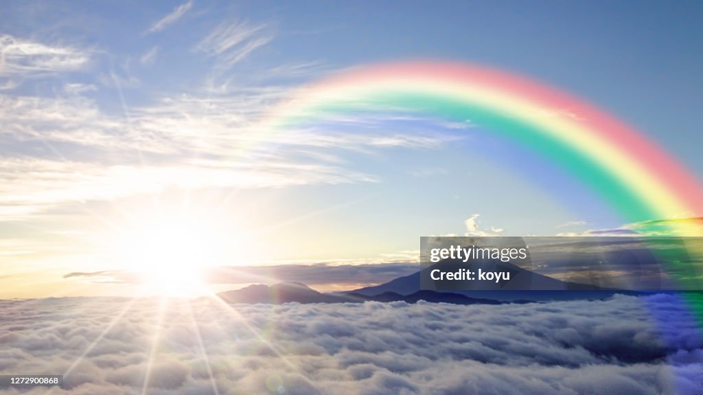 The sea of clouds surrounding Mt. Fuji and the sunrise from the horizon