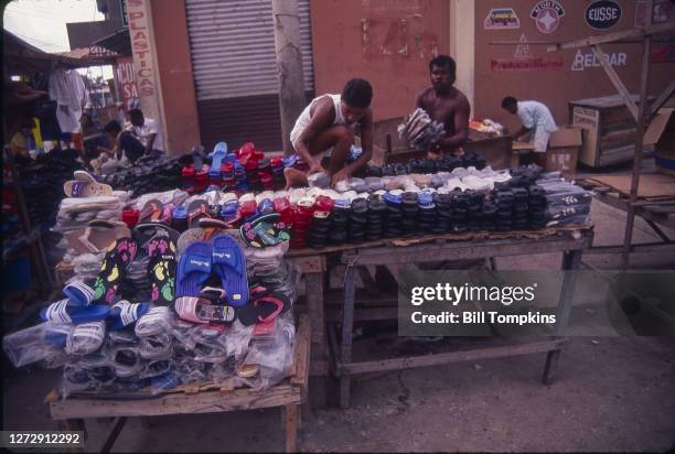 May 1987]: MANDATORY CREDIT Bill Tompkins/Getty Images Flip flop stand. The city of Cartagena, known in the colonial era as Cartagena de Indias...