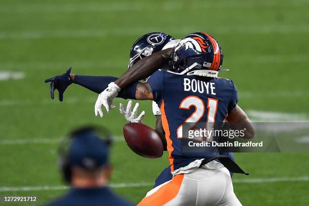 Bouye of the Denver Broncos breaks up a pass intended for A.J. Brown of the Tennessee Titans in the first quarter of a game at Empower Field at Mile...