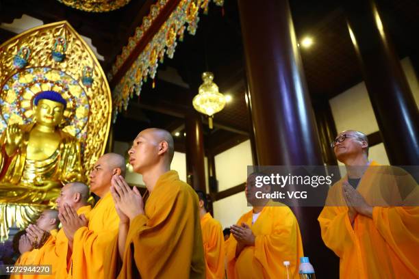 Monks pray during Ksitigarbha Bodhisattva's birthday celebration on the 29th day of the 7th lunar month at Nanshan Temple on September 16, 2020 in...
