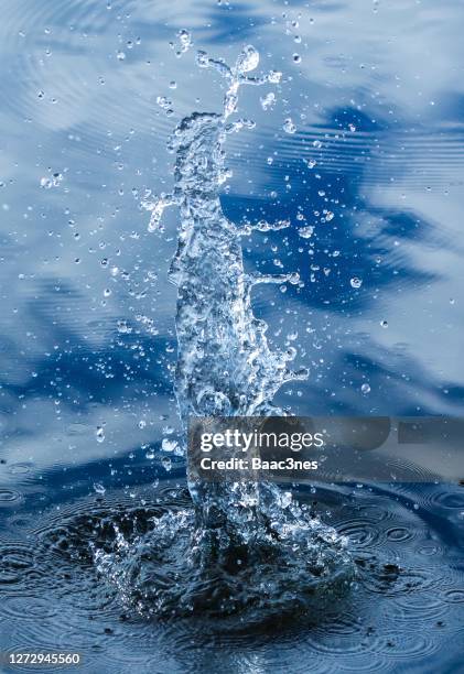 water splash - throwing rocks stock pictures, royalty-free photos & images