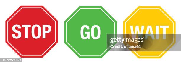 stop-wait-go-zeichen - stopschild stock-grafiken, -clipart, -cartoons und -symbole