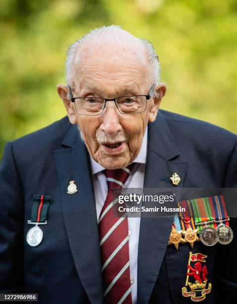 Captain Sir Tom Moore poses during a photocall to mark the launch of his memoir "Tomorrow Will Be A Good Day" at The Coach House on September 17,...