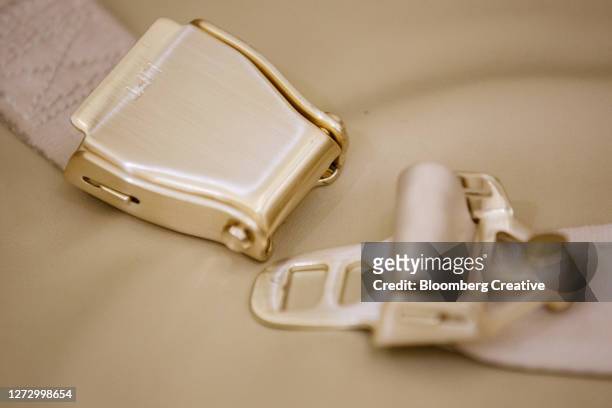 airplane seat belt - seat belt stock pictures, royalty-free photos & images