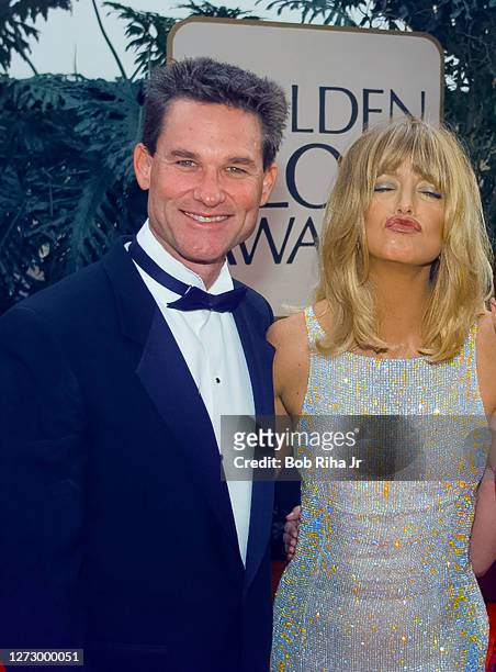 Goldie Hawn and Kurt Russell arrive at the 55th Annual Golden Globes Awards Show, January 18, 1998 in Beverly Hills, California.