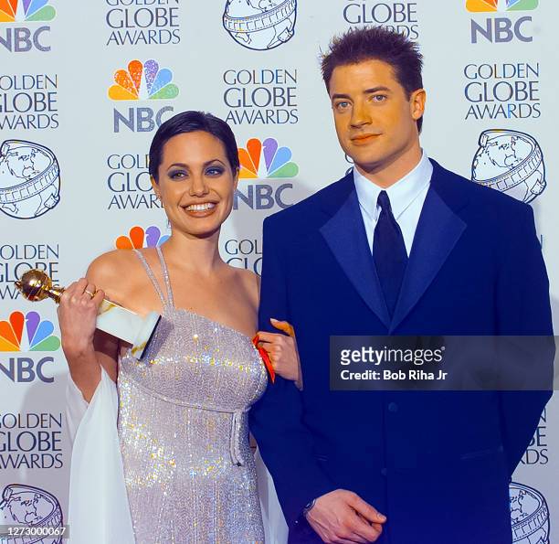Winner Angelina Jolie and Brendan Fraser backstage at the 55th Annual Golden Globes Awards Show, January 18, 1998 in Beverly Hills, California.