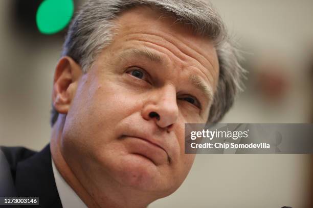 Federal Bureau of Investigation Director Christopher Wray testifies before the House Homeland Security Committee during a hearing about 'worldwide...