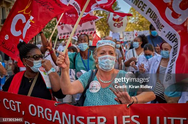 Hospital and healthcare workers demonstrate during a day of strikes throughout France called by seven French Unions calling for a new social...