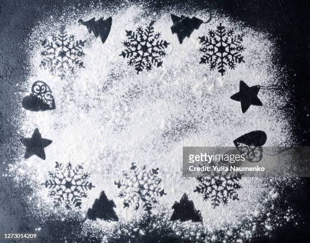 christmas background with candies, snowflakes and christmas tree branches. - flour christmas stock pictures, royalty-free photos & images