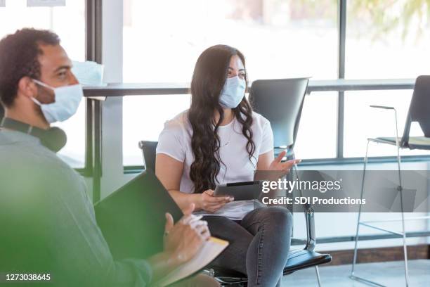 businesswoman leads business strategy meeting - employee engagement mask stock pictures, royalty-free photos & images