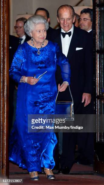 Queen Elizabeth II and Prince Philip, Duke of Edinburgh attend a party to celebrate The Queen's 80th birthday at the Ritz Hotel on December 5, 2006...