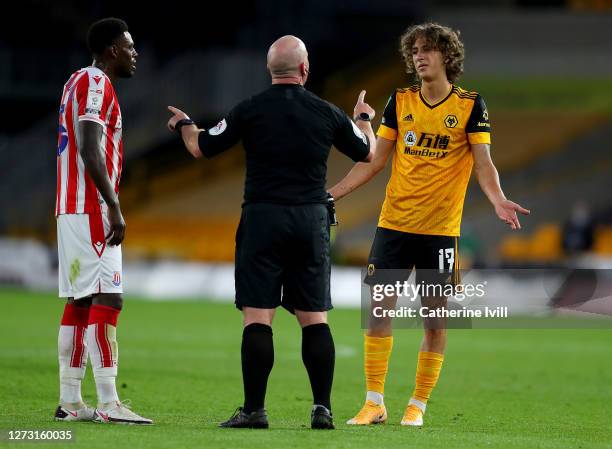 Fabio Silva of Wolverhampton Wanderers and Bruno Martins Indi of Stoke City appeal towards the referee during the Carabao Cup second round match...