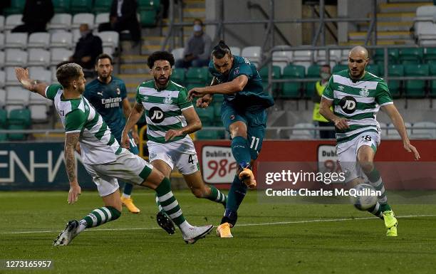 Zlatan Ibrahimovic of AC Milan scores his sides first goal during the UEFA Europa League second qualifying round match between Shamrock Rovers and AC...